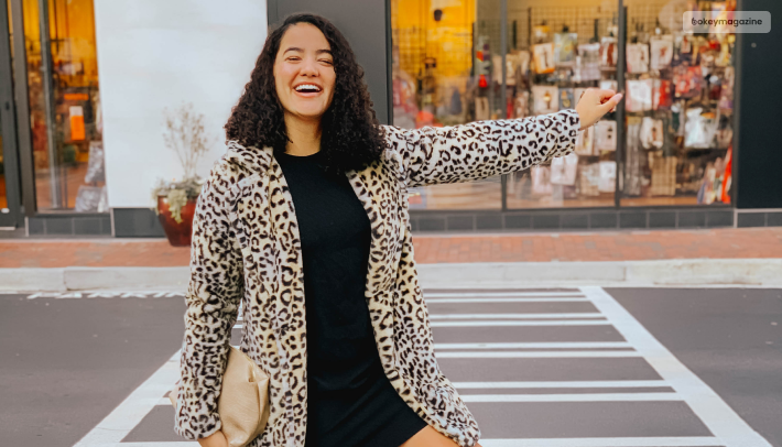 A Black Dress With A Cheetah Print Jacket